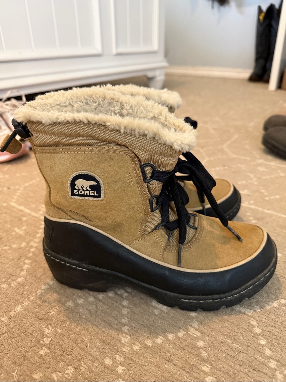 Sorel Tan and Black Lace-Up Faux Fur Winter Boots
